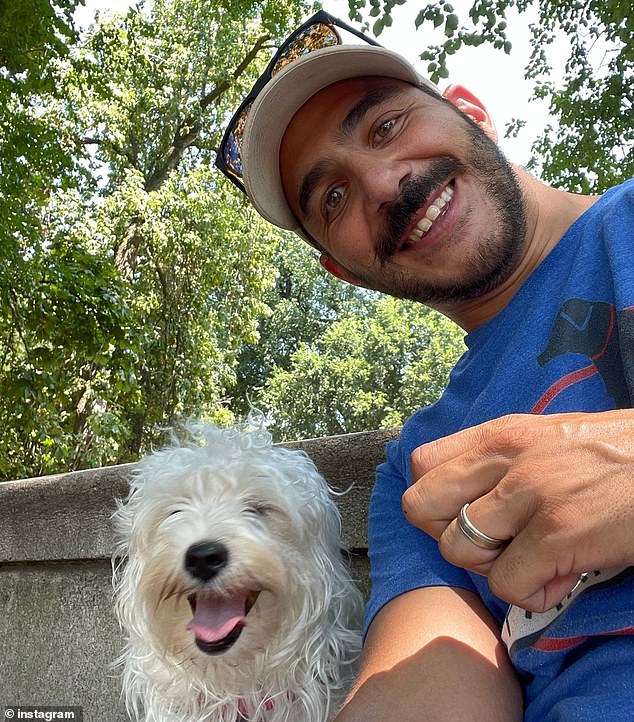 Michael Josephs and a satisfied customer.  He began walking dogs professionally in 2019.