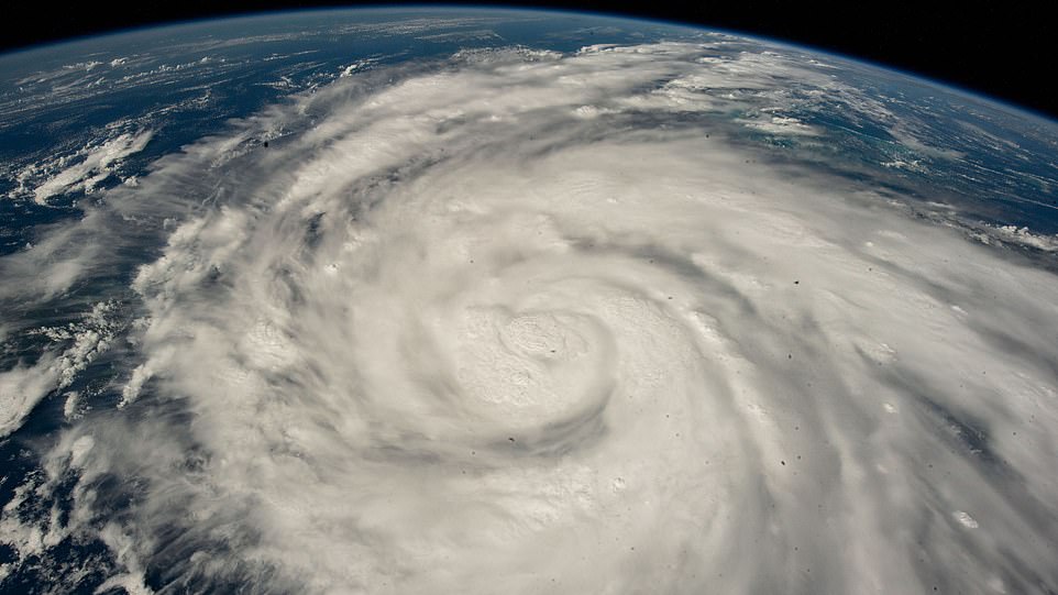 Hurricane Ian is shown from the International Space Station as it orbited 258 miles above the Caribbean Sea east of Belize.  At the time of this photograph, Ian was just south of Cuba gaining strength and heading towards Florida.