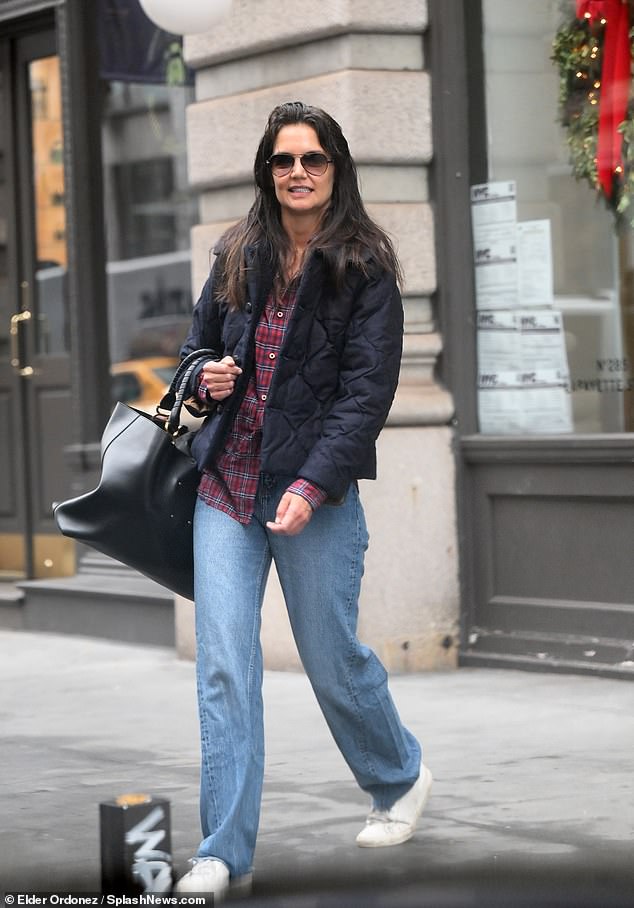 Dressed down: A month after ending her latest romance, Dawson's Creek alum Katie Holmes dressed up for a business meeting in New York City on Tuesday