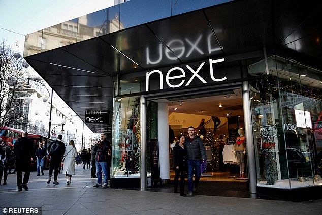 Christmas spirit: Next raised its profit forecast for the year after revenue exceeded expectations by £66m in the nine weeks to December 30