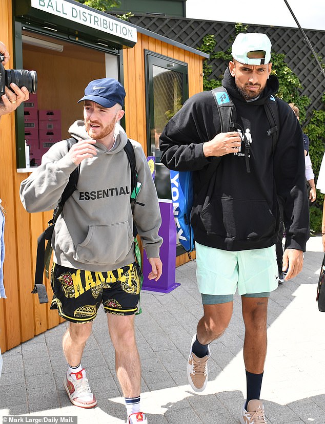 Manager Daniel Horsfall (pictured with Nick Kyrgios at Wimbledon last year) has exposed a vile and threatening message he received, saying it's worse than what Todd Woodbridge received from a 'shameful' troll this week.