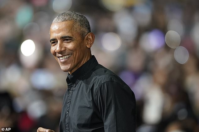 Barack Obama is seen at a rally for Senator Raphael Warnock in Atlanta on December 1.  The former president's spokeswoman did not say whether he is now checking to see if the classified material has been mistakenly stored in his own residences.