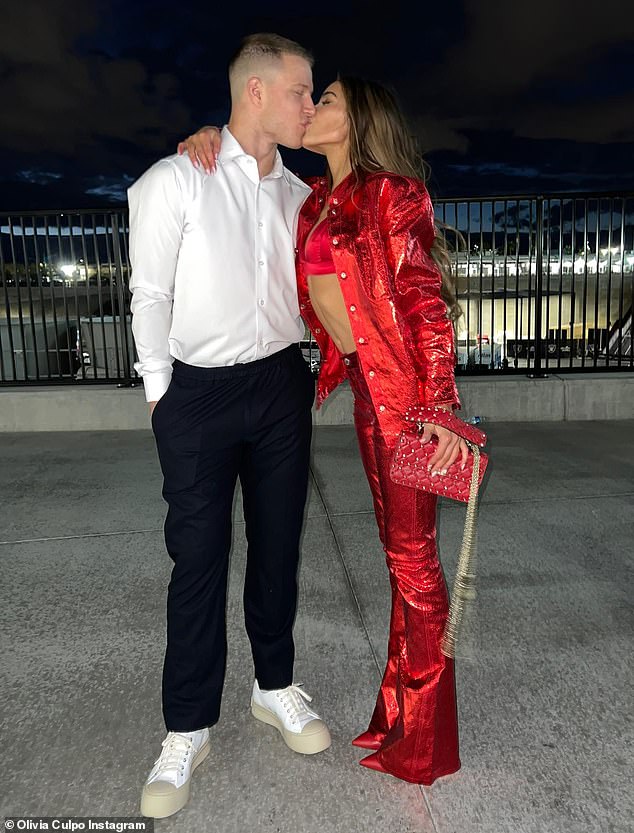 Ringing in the New Year: Olivia Culpo, 30, took to Instagram to show off her boyfriend Christian McCaffrey, 26, and their fourth New Year's kiss together on Monday