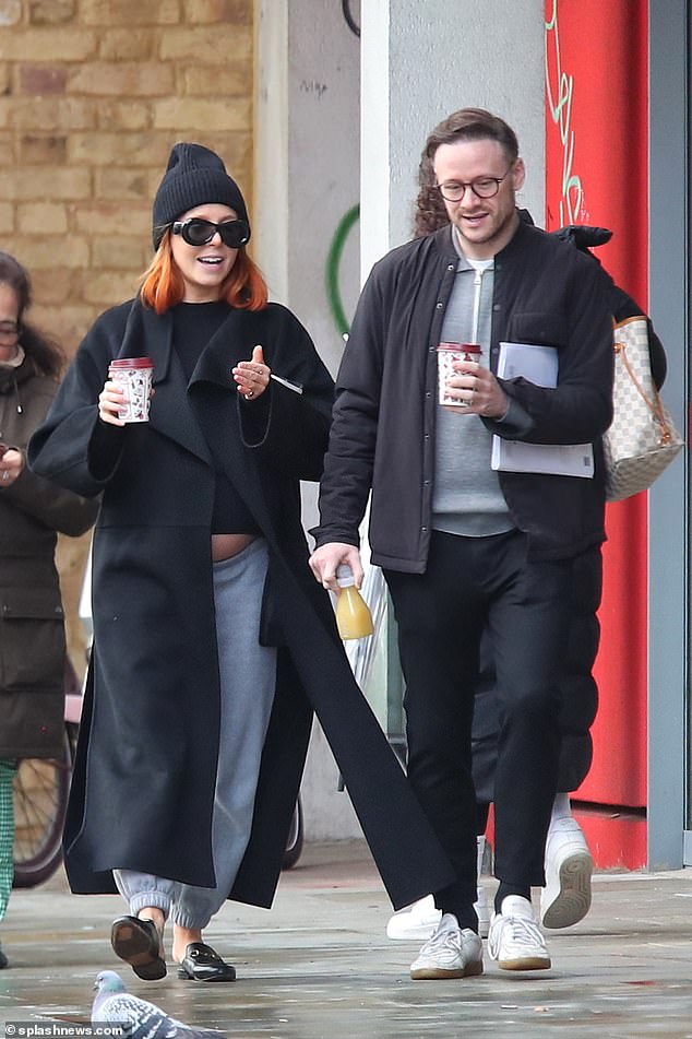 Laid back: Stacey Dooley and Kevin Clifton looked chill when they went out for coffee in London on the Sunday before the birth of their first child