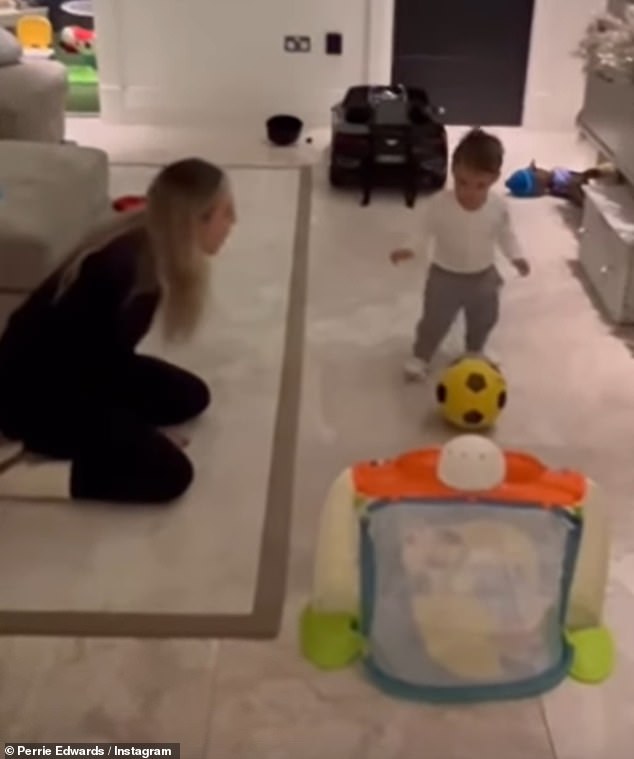 Adorable: Perrie Edwards has shared a sweet video of her son Axel following in his footballer dad's footsteps