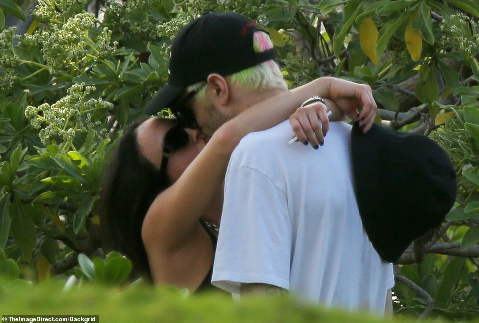 PDA: Pete Davidson and Chase Sui Wonders shared several kisses during their romantic vacation in Hawaii