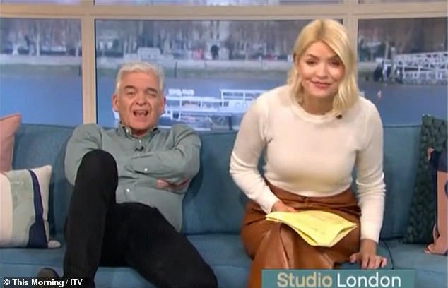 Fuming: On Tuesday, Phillip Schofield, 60, and Holly Willoughby, 41, of This Morning, infuriated viewers as they fussed over wine connoisseurs enjoying fondue in a jacuzzi in the Swiss Alps.