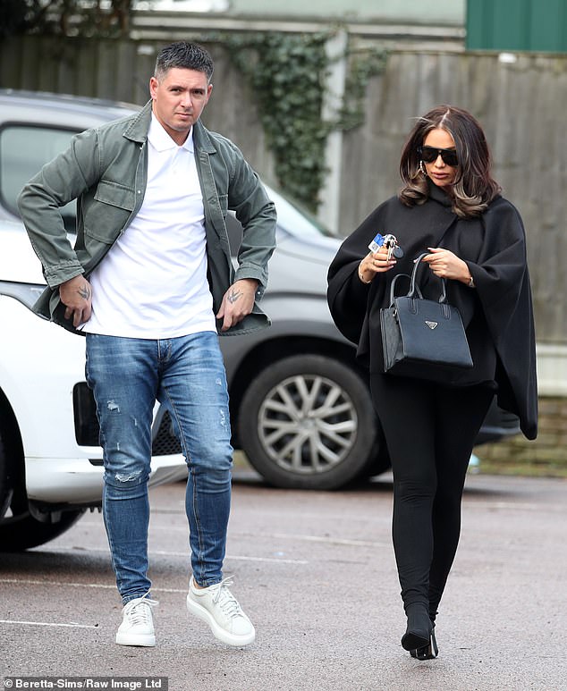 Back to that: Pregnant Amy Childs cradled her bump and wore a cape dress while filming for TOWIE alongside her boyfriend Billy Delbosq and their co-stars in Essex on Thursday.