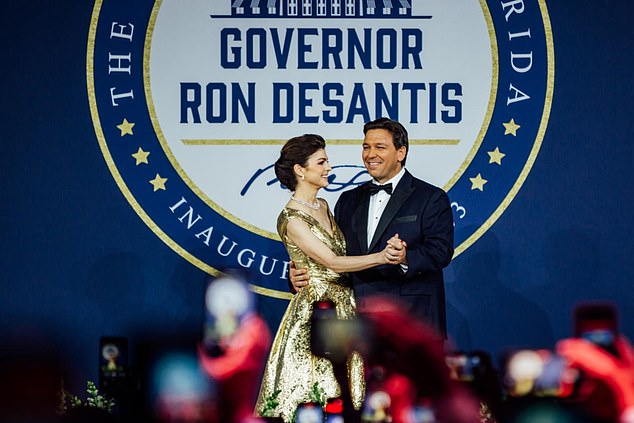 Governor Ron DeSantis twirled his wife and first lady Casey DeSantis, who donned a gold ball gown, during a dance onstage at his second inaugural ball Tuesday.