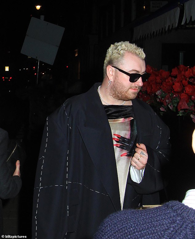 Congrats Sam: Sam Smith, 30, kept up his genre-defying style as they celebrated the release of his new album Gloria at London's 34 Mayfair restaurant on Friday night.