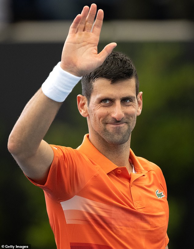 Novak Djokovic waves to the crowd after winning his Adelaide International opener on Tuesday.