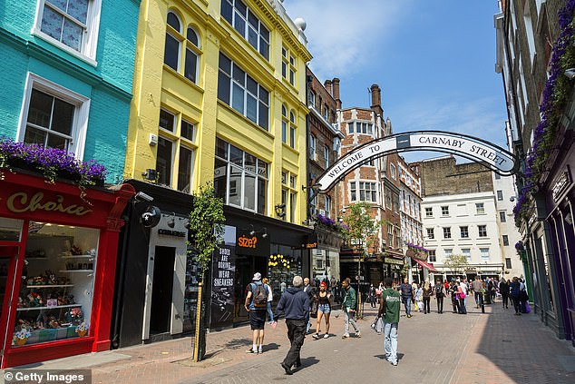 Warning: West End property giant Shaftesbury, which owns land like Carnaby Street (pictured), said railway strikes in the run-up to Christmas were devastating