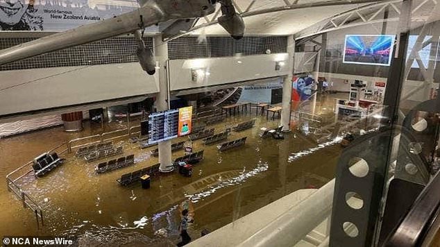 The Qantas check in area at Auckland airport last night as around 20 passengers were forced to stay overnight on board a canceled flight