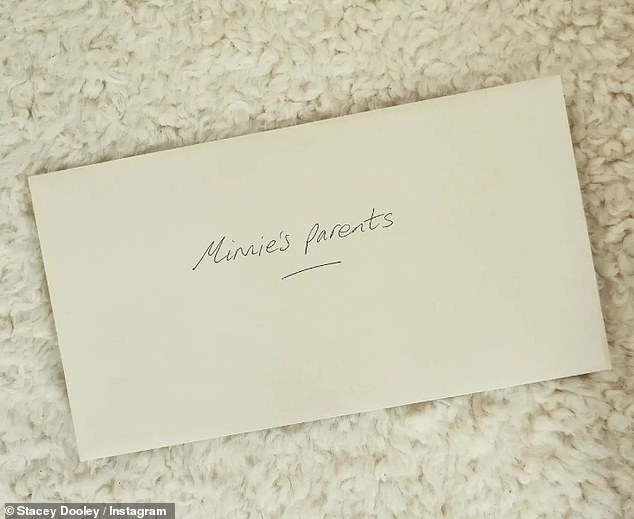 Baby joy: Stacey and Kevin revealed their son was born on Monday when they shared a photo of an envelope addressed to 'Minnie's parents'