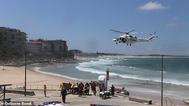 A swimmer died on a popular beach in Cronulla and two others were rushed to hospital, one in critical condition.