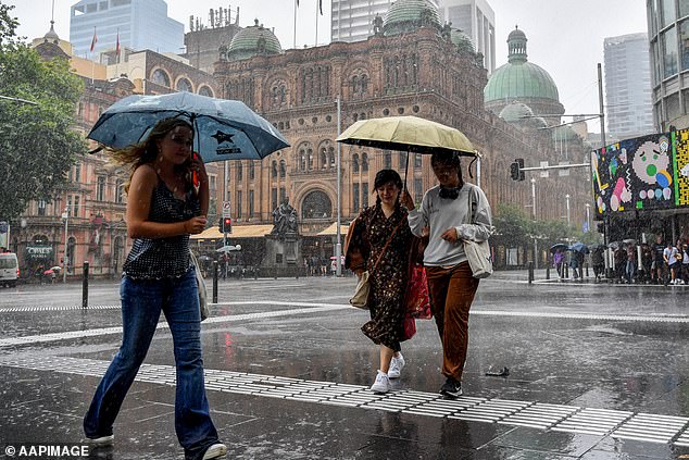 A trough over NSW will bring rain to the northeast of the state and gusty southerly winds along the north coast on Thursday following wet conditions (rain in Sydney pictured)