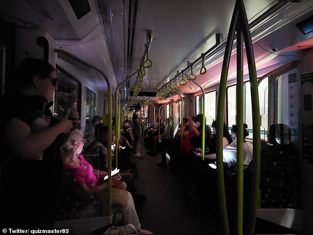 Hundreds of subway passengers have been left sitting in pitch darkness with no air conditioning after their train shut down