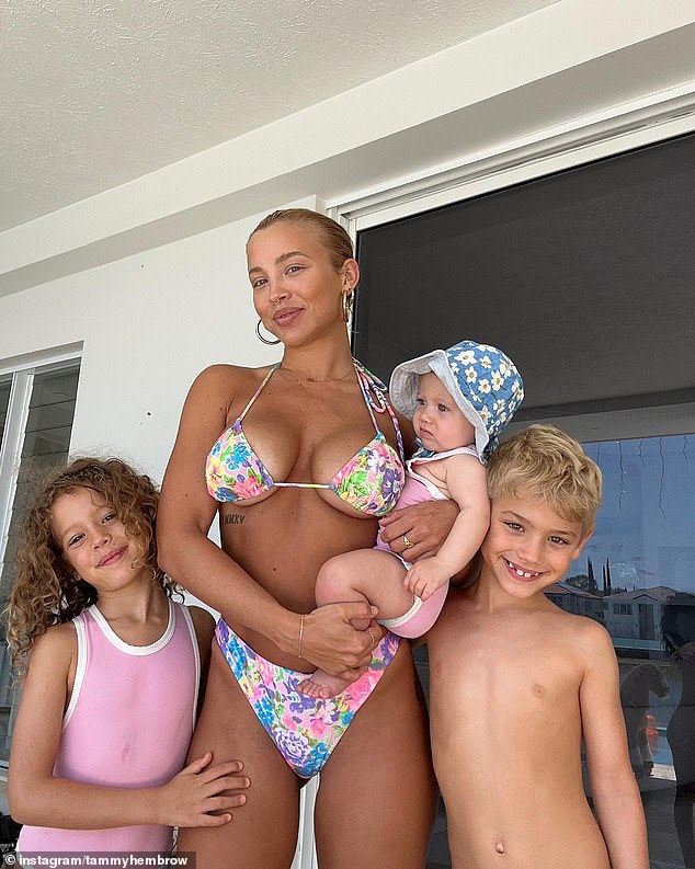 Tammy Hembrow was appreciating her family on Saturday.  The 28-year-old showed off her sensational figure in a multicolored floral bikini in a post on Instagram.  In the photo of her with her children