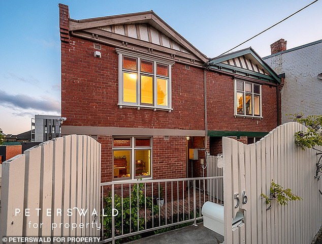 A charming 1920s terrace house in North Hobart may look ordinary from the outside, but it hides a unique feature that is much loved by locals.