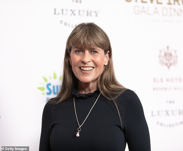 Terri Irwin (pictured) revealed the three things she does in bed to stay 'happy', after urging her son Robert to 'keep things PG' with his first girlfriend.