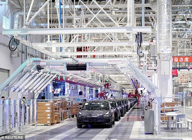 Tesla unloaded a record number of cars this year, new delivery numbers have revealed.  The data is the closest approximation of sales for the company, which has seen its share price fall amid heightened competition and the recent closure of its Shanghai factory (pictured).