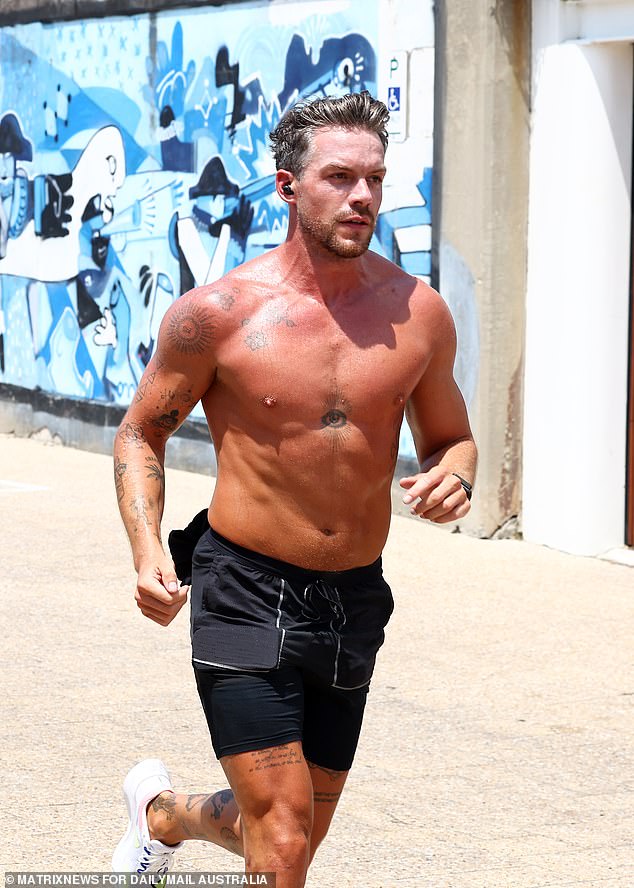 The Bachelors' Thomas Malucelli (pictured) showed off his tanned physique while out for a run at Sydney's Bondi on Sunday.