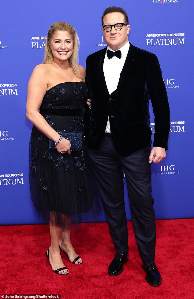 The Latest: Brendan Fraser, 54, and his partner Afton Smith, 55, were photographed on the red carpet at the Palm Springs International Film Festival awards gala, where the actor will be honored for his performance in The Whale .