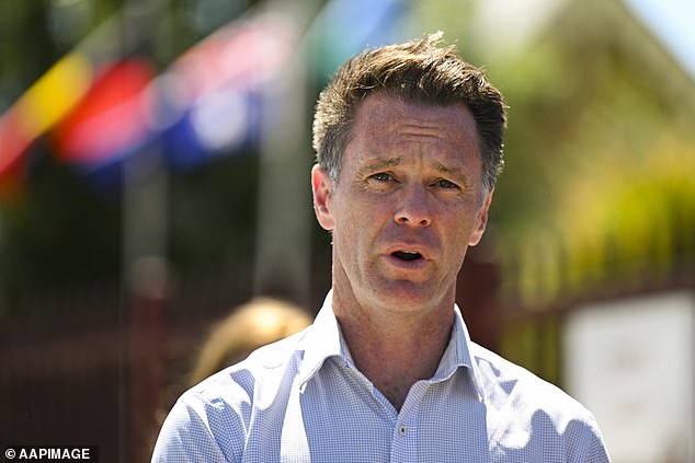 NSW Labor leader Chris Minns (pictured) did not commit to a cashless play card, instead opting for a 12-month trial.  He also announced a ban on political donations from clubs on Monday.