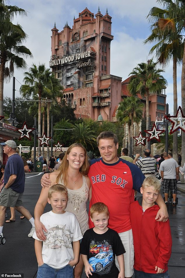 The whole family is pictured in happier times at the Tower of Terror at Disney World