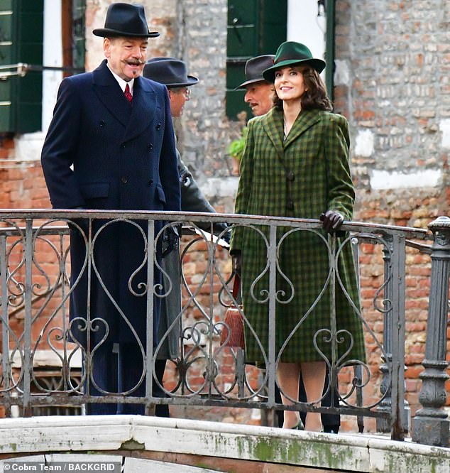 On set: Tina Fey got into character in a vintage plaid coat and matching green hat this week while filming A Haunting in Venice alongside Kenneth Branagh in Italy.