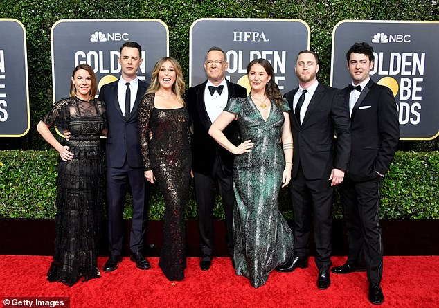 Fighting back: Tom Hanks hit back at claims his children were the beneficiaries of nepotism as he insisted they were all getting into the 'family business' (Hanks pictured 2020 with L-R with Samantha Bryant, son Colin, wife Rita Wilson , daughter Elizabeth, and sons Chet and Truman)