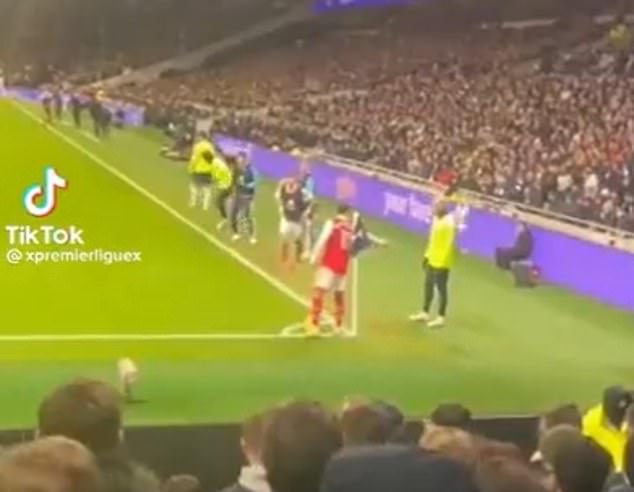 Tottenham striker Richarlison (right) avoids the punch of Arsenal's Gabriel Martinelli (centre) during a fiery north London derby, footage posted on social media has revealed.