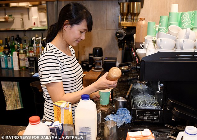 The federal Labor government has clashed with business groups and economists after the December quarter consumer price index rose 7.8 percent, the fastest annual pace since the early 1990s (pictured, a barista from Sydney makes a caramel latte)