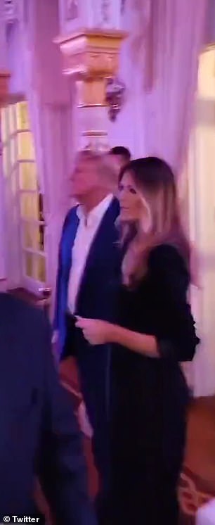 Donald and Melania Trump listen to The Village People's 'YMCA' during an event at Mar-a-Lago on Sunday