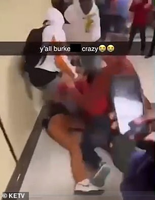 Video of the fight shows a group of children attacking a student at Burke High School.