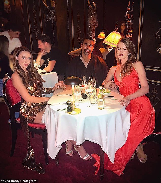 Three's a crowd: Una Healy (left) shared a VERY cozy picture with boxer David Haye (centre) on holiday in Marrakech on Tuesday, leaving fans convinced they're dating - but his girlfriend Sian Osbourne (right) was too! over there!