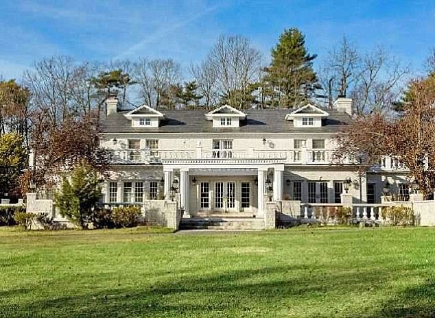 Victoria Gotti's million-dollar home was bought by JP Morgan in October.  The house was seen on the reality show 'Growing Up Gotti' from 2004 to 2007 on A&E with Victoria and her children.  In the photo: the mansion before the raid.