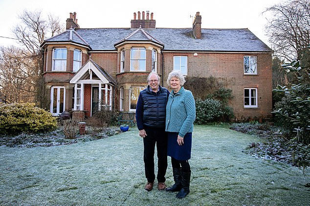 Selling: David and Ann Watney are looking to release cash from their six-bedroom detached house in Dorking, Surrey, which is now for sale for £1,275 million