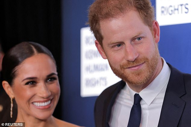 Questions about whether Prince Harry (pictured with his wife Meghan) should be allowed to retain his official titles have raged since he stepped down from royal duties.