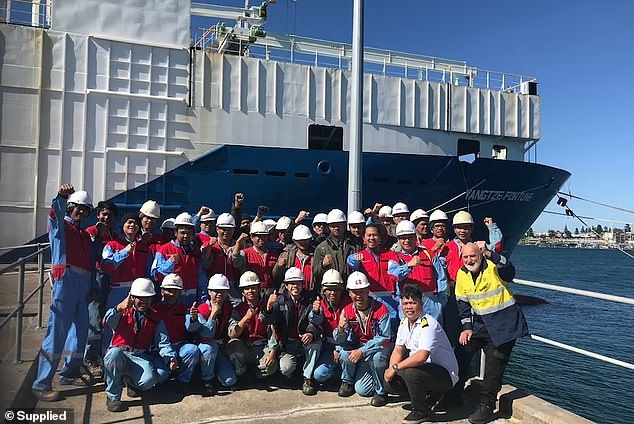 There were originally 36 crew members (pictured) on the Liberian-flagged container ship Yangtze Fortune which has been anchored in Portland, south-west Victoria, since September 28.