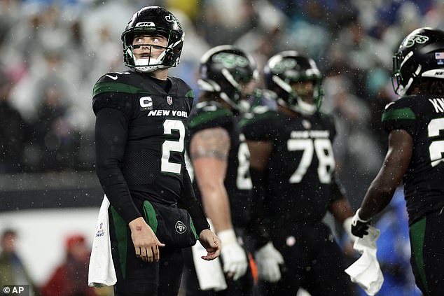 Zach Wilson (L) will not be the New York Jets' quarterback next season, it has been claimed