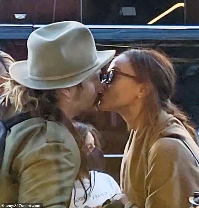 Love is in the air!  Zoe Saldana and her husband, Marco Perego, seem to be more in love than ever.  The couple filled out the PDA, sharing a kiss after landing with their three children at Los Angeles International Airport.