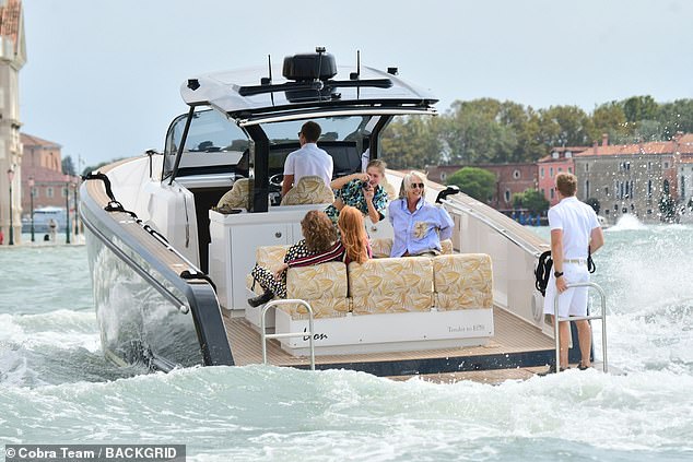 The actress takes to the water with friends while enjoying the Italian sun on her boat during her vacation in Venice