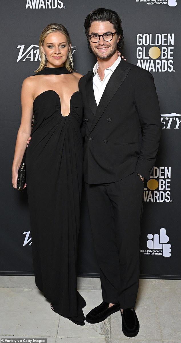 Her look: For the star-studded occasion, Ballerini donned a strapless Yves Saint Laurent gown with a matching scarf