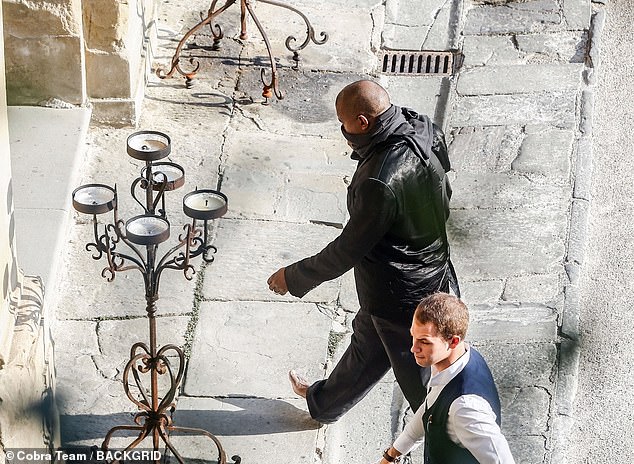 Barefoot: Both Kanye and Bianca – who has drawn the ire of locals with her very revealing outfits – went barefoot as they strolled the streets of Italy