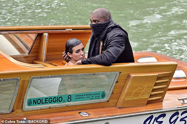 In love: Just a day later, Kanye was pictured baring his bare bottom during an amorous boat ride with Bianca in Venice, with calls for the couple to be arrested for indecent exposure