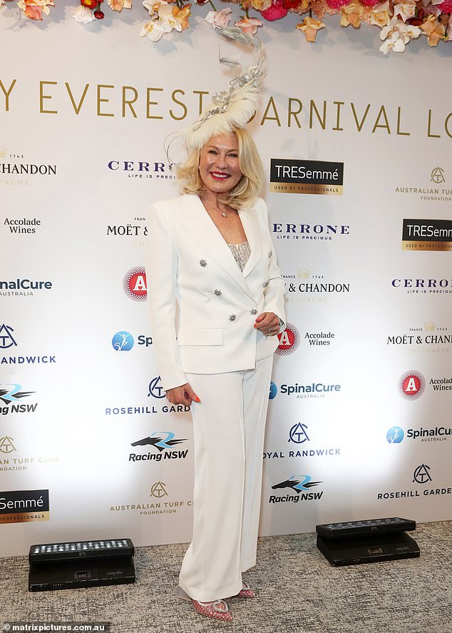 The veteran television presenter who once co-hosted Network 10's Good Morning Australia shone in a white trouser suit with silver buttons