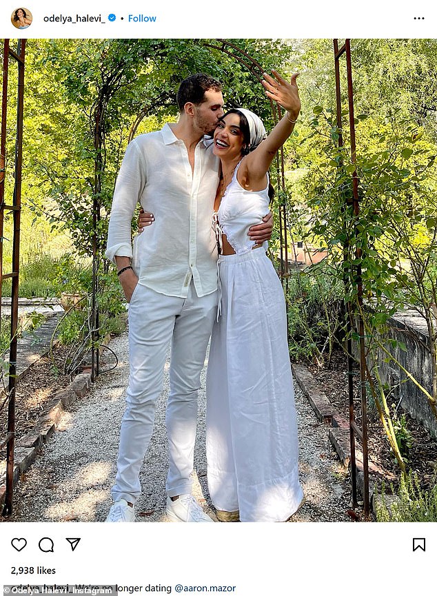 Excited: Both dressed in summer white, the Law & Order star also showed off her ring as she stood under an outside gate as Mazor gave her a kiss on the cheek