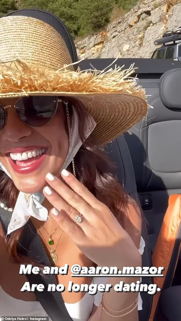 Bling: Halevi once again showed off her engagement ring while driving the convertible