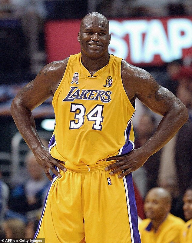 The four-time NBA champion said he weighed up to 395 pounds in 2002.  Pictured in LA in June 2002